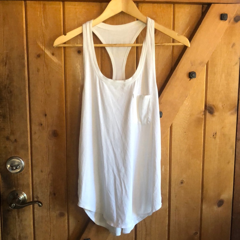 Yogi Racerback III, White. Size 6.